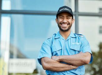 happy man, portrait and security guard with arms crossed in city for career safety or outdoor protec