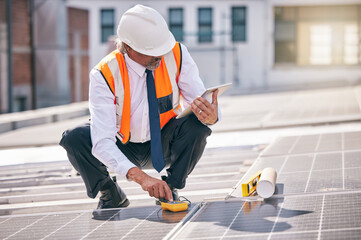 Wall Mural - Tablet, solar panels and engineering man on rooftop, city and urban development, sustainability or energy saving installation. Digital technology, inspection and electrician or person with power grid