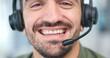 Call center, man face and consultant in virtual communication, business support and ecommerce help. Mouth, headphones and happy IT agent or sales person closeup for customer service and speaking