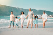 © Daniels C/peopleimages.com - Generations, holding hands and walking family on beach and ocean waves, freedom and bonding in nature. Grandparents, parents and kids, people outdoor and travel with trust and love on Mexican holiday