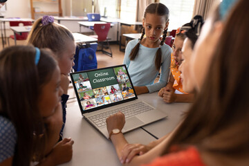 Poster - Asian female teacher and diverse students having a video conference on laptop at school