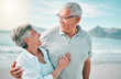 © Daniels C/peopleimages.com - Happy, hug or old couple laughing on beach with love, care or support on summer vacation in nature. Retirement, mature man talking or funny senior woman at sea or ocean to travel on holiday together