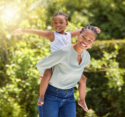 Wall Mural - Black family, portrait and piggy back outdoor with happiness and smile in a park. Mom, young girl and happy kid in nature with mother and child together on a lawn on summer holiday having fun