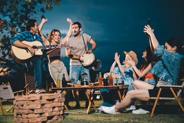 summer party camping of friends group with guitar music, happy young woman and smiling man having fun in vacation holiday, nature outdoors travel of friendship lifestyle together, bar-b-q party time