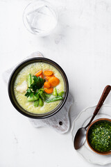 Wall Mural - Minestrone soup with parsley pesto sauce, vegetable cream soup