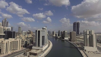 Sticker - DUBAI, UAE - DECEMBER 2016: Aerial view of Downtown Dubai at sunset. The city attracts 20 million people annually