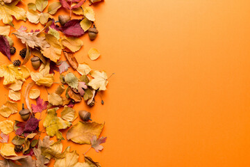 autumn composition. pattern made of dried leaves and other design accessories on table. flat lay, to