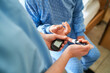 © Robert Kneschke - Nurse checking blood sugar of diabetic patient at nursing home