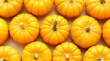 Pumpkins Patterned Over White Background, Top View