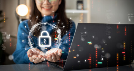 Wall Mural - Cybersecurity technology concept. A person is using a computer with data privacy protection from digital threats. Protect system hardware, software and applications Connect to work on the Internet.