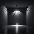 A dark room with a spotlight shining down, highlighting a single point on the floor.