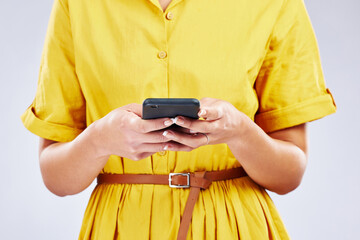 Fototapete - Phone, chat or hands of woman in studio on social media, mobile app or internet web networking online. Texting, research or closeup of person typing on digital technology web on white background