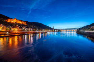 Wall Mural - Heidelberg castle at night along the Neckar River, Germany