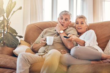 Poster - Senior couple, watching tv and sofa in relax for streaming, movie or series in living room at home. Elderly man and woman with coffee and remote together for changing channel and online entertainment