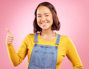 Canvas Print - Happy, thumbs up and yes with portrait of woman in studio for support, agreement and motivation. Winner, emoji and success with person on pink background for achievement, thank you and vote sign