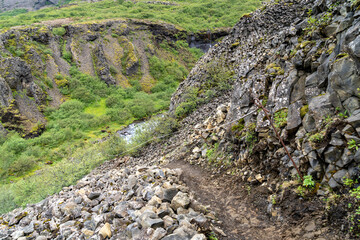 Wall Mural - Steep rocky hiking trail to Glymur Waterfall in Iceland