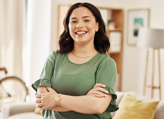 Portrait, smile and woman in home with arms crossed, relax in good mood and me time in Colombia. Face of happy young female person in living room with confidence, freedom and enjoy break in apartment