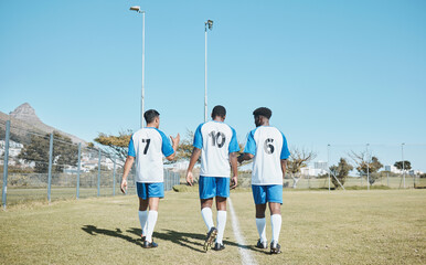 Soccer, team and walking on field with back or conversation at training or competition in out with grass. Fitness, teamwork and stadium with football player after game or collaboration at club.