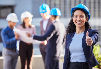 Business woman, portrait and architect with thumbs up in construction for winning, success or teamwork on site. Happy female engineer with thumb emoji, yes sign or like for approval in architecture