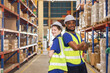 warehouse worker team portrait multiracial standing together happy smiling for industry labor enjoy working teamwork