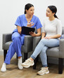 © Ismail/peopleimages.com - Clipboard, doctor and woman in clinic office, healthcare service and talking, questions or women consultation. Consulting, checklist and nurse or people helping, medical advice or insurance survey