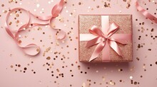 Pink Ribbon Bow On Craft Paper Giftbox Over Large Shiny Sequins Isolated Pink Background