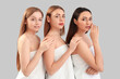 © Pixel-Shot - Young women with beautiful makeup on grey background