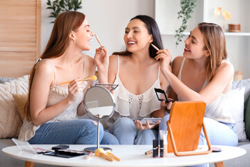 Sticker - Young women doing makeup at home