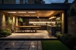 At night, observe the striking sight of a stunning kitchen extension from the outside.