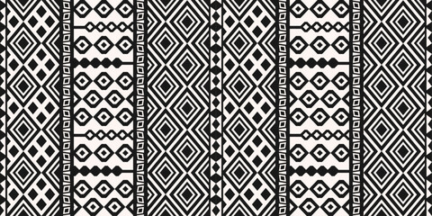 Poster - Vector ethnic pattern. Monochrome pattern of ethnic black and white ornament. Design for textile, fabric, clothing, curtain, rug, batik, ornament, background, wrapping.