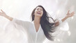 © Surachetsh - Pretty lady in white Hyper Realistic dress exudes happiness, raising her arms with a relaxed smile, showcasing her happy emotion on a white backdrop. Generative AI