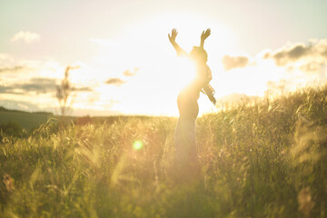 An elderly woman in fashionable clothes enjoying a serene day outdoors, symbolizing the peace of mind financial planning can bring