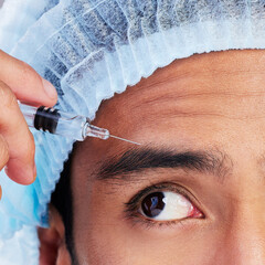 Canvas Print - Eye, hand and plastic surgery with a man in studio on a gray background for silicon injection. Face, beauty and transformation with a male client in a clinic for antiaging filler or cosmetic facelift