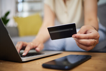 Canvas Print - Hands, credit card and ecommerce on laptop in home for digital payment, fintech password and online shopping. Closeup of person, computer and customer banking for financial bills, budget and account