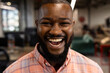 © Wavebreak Media - Portrait of a african american businessman smiling at modern office