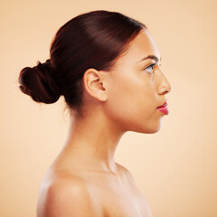 Sticker - Skincare, makeup and side face of a woman on a studio background for natural and healthy wellness. Serious, facial and a girl with beauty, cosmetics and showing headshot profile on a backdrop