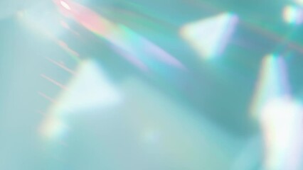 Wall Mural - Rainbow Decay from the Lens. Loop. The optical lens system creates a series of bright, changing geometric highlights on a light surface