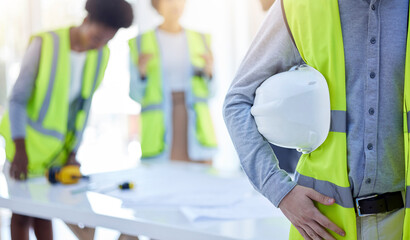 Construction worker, closeup and helmet with arm of engineer, builder or contractor. Industrial team, handyman gear and person with protection and safety for engineering and architecture project