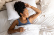 © Wavebreak Media - Biracial woman sleeping in bed in bedroom