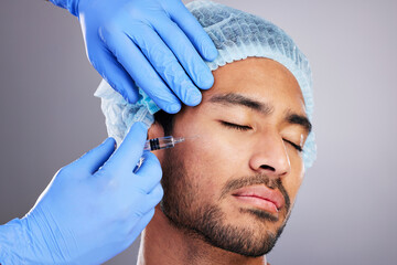 Canvas Print - Hands, implant and plastic surgery with a man in studio on a gray background for a silicon injection. Face, beauty and transformation with a male customer in a clinic for antiaging dermatology filler