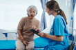 © Phushutter - Female doctor examined patient health peace of mind. Basic procedure for general examination, Medical history taking, Physical examination, Blood test. stomach disease, hypertension, osteoporosis