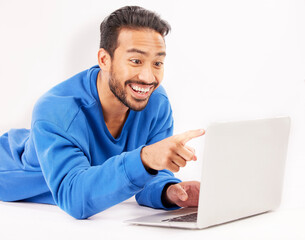 Aufkleber - Surprise, laptop and man pointing on studio floor isolated on a white background. Computer, happy and person on ground for social media, streaming movie or film, video or show on internet with tech