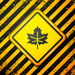 Sticker - Black Leaf icon isolated on yellow background. Leaves sign. Fresh natural product symbol. Warning sign. Vector