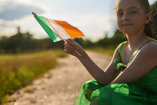 Cute Little Girl Waving With Irish Flag