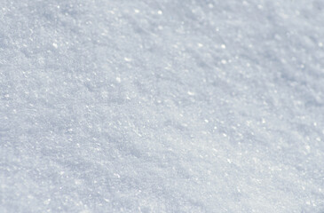 Wall Mural - Background of fresh white snow. Winter snowflakes texture.