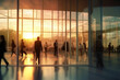 © Creative - Silhouette of business people walking in the office with sunlight effect
