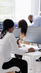 Wall Mural - African Business Team Working On Computer