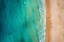 Beach With Turquoise Water On Fuerteventura Island, Spain, Canary Islands. Aerial View Of Sand Beach, Ocean Texture Background, Top Down View Of Beach By Drone. Fuerteventura, Spain, Canary Islands.