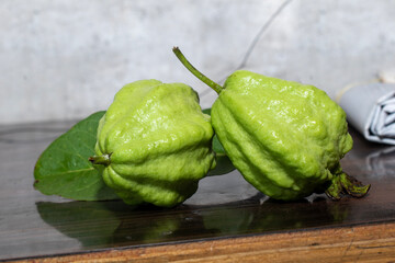 Sticker - Guava fruit with leaf on a wooden background, Guava fruit on the brown wooden table