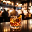 © Samira - Whiskey on the rocks with ice cubes on a dark background